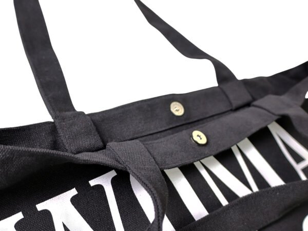 Woman of God black Christian tote bag made from premium 16oz fabric with reinforced handles and secure magnetic closure