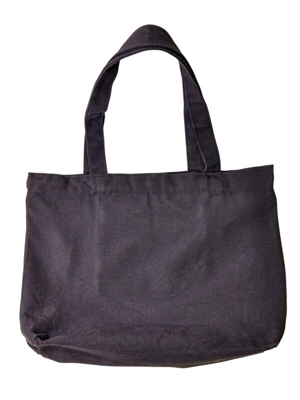 Woman of God black Christian tote bag made from premium 16oz fabric with reinforced handles and secure magnetic closure